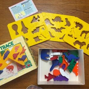Vintage Place and Trace Puzzle Stencil Set Discovery Toys - Dinos and vehicles